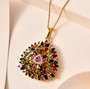 multi color tourmaline and moissanite pendant necklace in rhodium over sterling silver shown in a lifestyle photo