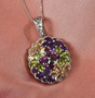 multi gemstone cluster pendant necklace in rhodium over sterling silver shown in a lifestyle photo
