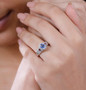 ceylon sapphire rubellite tourmaline and zircon ring in rhodium over sterling silver worn on a hand