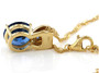 back view of lab blue spinel pendant necklace in 18k yellow gold over sterling silver