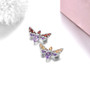 close up of garnet or citrine and amethyst butterfly brooch in rhodium over sterling silver