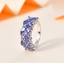 tanzanite cluster ring in rhodium over sterling silver shown in a lifestyle photo