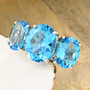Swiss-blue-topaz-trilogy-ring-live-GGS1309