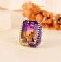 ametrine amethyst and citrine cocktail ring in rhodium over sterling silver shown in a lifestyle photo