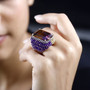 ametrine amethyst and citrine cocktail ring in rhodium over sterling silver worn on a hand
