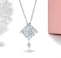 close up of aquamarine pendant necklace in rhodium over sterling silver