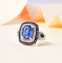 kyanite iolite and moissanite halo ring in rhodium over sterling silver shown in a lifestyle photo