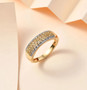 yellow and white diamond cluster band ring in 18k yellow gold over sterling silver shown in a lifestyle photo