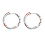 side view of blue and orange zircon hoop earrings in rhodium over sterling