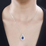 kyanite and white zircon pendant necklace in 18k yellow gold and rhodium over sterling silver worn around the neck