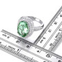 oval green fluorite and white zircon halo ring in rhodium over sterling silver shown for size comparison