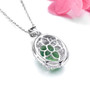 back view of oval green fluorite and white zircon halo pendant necklace in rhodium over sterling silver