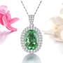 front view of oval green fluorite and white zircon halo pendant necklace in rhodium over sterling silver