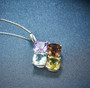 close up of lemon quartz smoky quartz prasiolite and amethyst necklace in rhodium over sterling silver