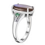 side view of oval ammolite emerald and diamond ring in rhodium over sterling silver