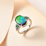 Ammolite-emerald-diamond-ring-live-GGS1339