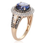side view of tanzanite champagne and white diamond ring in 14k yellow gold