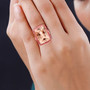 morganite and pink tourmaline cocktail ring in 14k rose gold on hand model