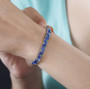 kyanite and chrome diopside tennis bracelet in rhodium over sterling silver worn on a wrist