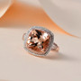 morganite pink cushion and white diamond halo ring in 14k rose gold shown in a lifestyle photo