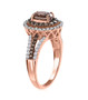 side view of oval champagne and white diamond halo ring in 14k rose gold