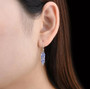 tanzanite dangle earrings in rhodium over sterling silver