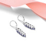 tanzanite dangle earrings in rhodium over sterling silver