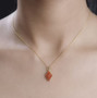 marquise fire opal cluster pendant necklace in 18k yellow gold over sterling silver worn around the neck