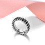black spinel or garnet with white zircon eternity band ring in rhodium over sterling silver