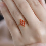 marquise fire opal cluster ring in 18k yellow gold over sterling silver worn on a hand