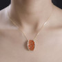 fire opal and white zircon pendant necklace in 18k yellow gold over sterling silver worn around the neck