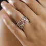 multi color sapphire and white zircon crossover band ring in rhodium over sterling silver worn on a hand