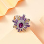 purple garnet amethyst and citrine ring in rhodium over sterling silver shown in a lifestyle photo