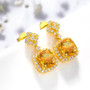 citrine or sky blue topaz and white zircon earrings in 18k yellow gold over sterling silver