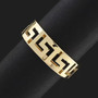 10k yellow gold greek key eternity band ring shown in a lifestyle photo