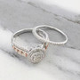 diamond two ring bridal set in 18k rose gold and rhodium over sterling silver shown in a lifestyle photo