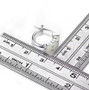 ethiopian opal huggie hoop earrings in rhodium over sterling silver shown for size comparison