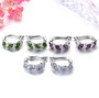full view of tanzanite and white zircon hoops in rhodium over sterling silver