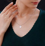 10-12mm round white edison pearl solitaire pendant necklace in rhodium over sterling silver worn around the neck