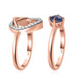 side view of blue kyanite and moissanite heart love knot two ring set in 18k rose gold over sterling silver