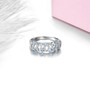 full view of aquamarine and white zircon ring in rhodium over sterling silver