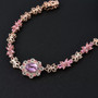 kunzite pink tourmaline and zircon bracelet in 18k rose gold over sterling silver shown in a lifestyle photo