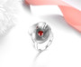 close up of garnet ring in rhodium over sterling silver
