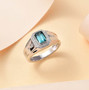 indicolite tourmaline and diamond emerald cut halo gents ring in solid 14k white gold shown in a lifestyle photo