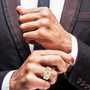 moissanite gents solitaire ring in 18k yellow gold over sterling silver worn on a hand