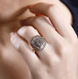 champagne diamond double halo cluster ring in 18k rose gold over sterling silver worn on a hand