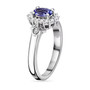side view of tanzanite and white zircon halo ring in rhodium over sterling silver