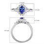 tanzanite and white zircon halo ring in rhodium over sterling silver shown for size comparison
