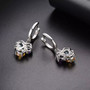 full view of amethyst citrine blue topaz and white zircon dangle earrings in rhodium over sterling silver