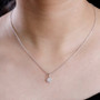 lab diamond cluster pendant necklace in rhodium over sterling silver worn around the neck